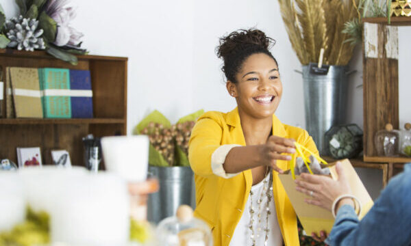 Saleswoman helping customer